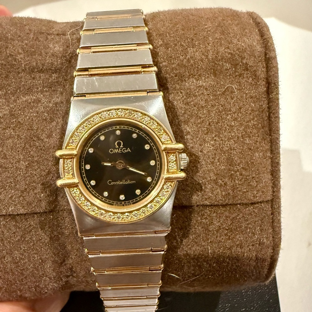 Omega Women's Silver and Gold Constellation Watch with diamond bezel